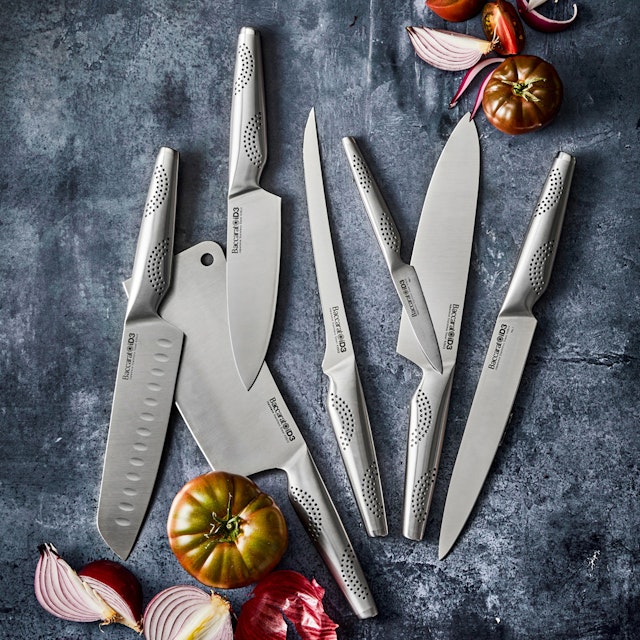 Kitchen Knives. Flat lay of assorted Japanese steel knives