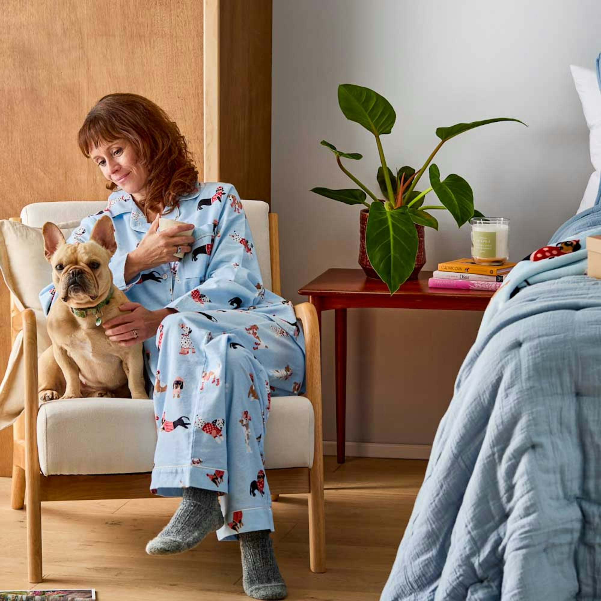 Mother's day 2025 - woman sitting on chair with dog